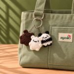 Crochet bear keychain set in a lifestyle setting