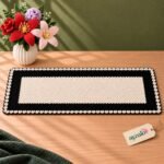 Black and ivory rectangular 18 by 36 inch crochet table runner by Ayzalo