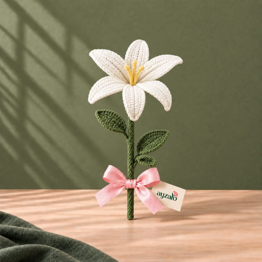 Ivory Whisper handmade white crochet lily single stem with pink ribbon by Ayzalo