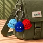 Mini Octopus crochet keychain in a lifestyle setting