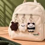 White polar bear crochet keychain in a lifestyle setting