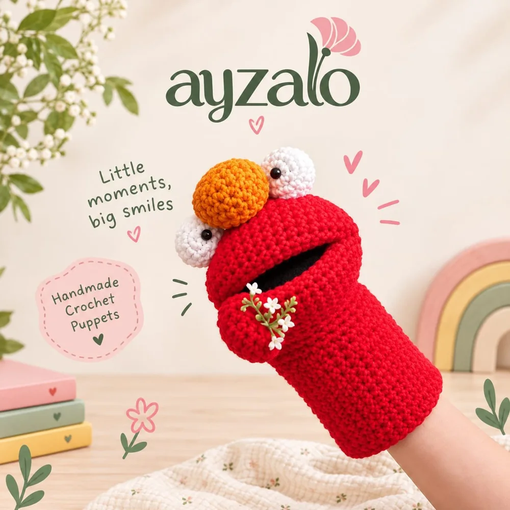 Red crochet hand puppet with an orange nose and small white flowers