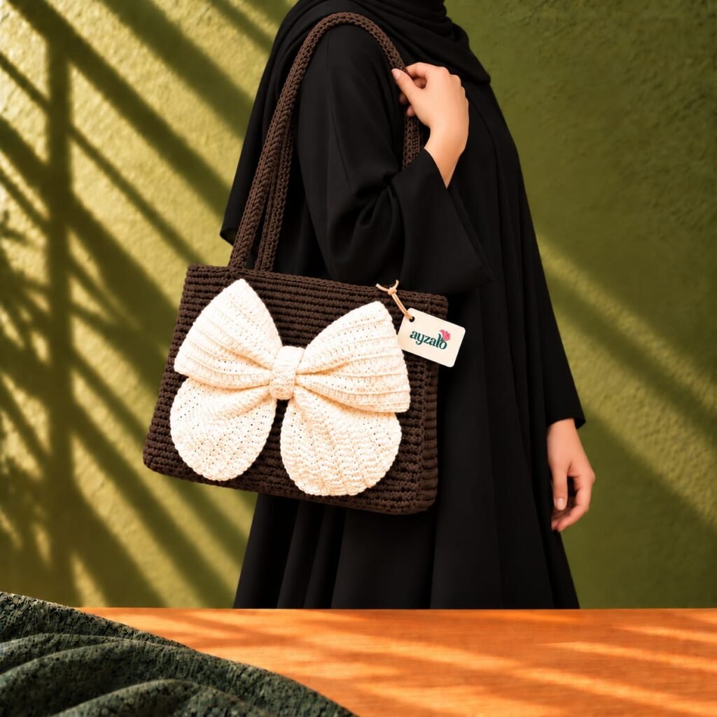 Cocoa Bow brown crochet shoulder bag by Ayzalo styled for everyday use in Pakistan