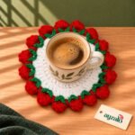Strawberry Border handmade crochet coaster with red strawberry bobbles and ivory base by Ayzalo