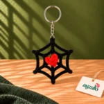 Gothic Heart black spiderweb keychain with vibrant red heart centre and silver-tone keyring by Ayzalo