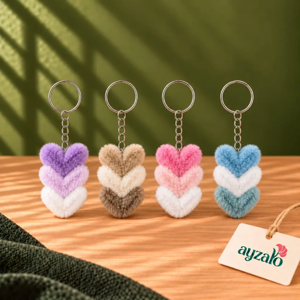 Stacked Hearts keychains in purple, beige, pink and blue gradient colour combinations by Ayzalo