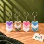 Stacked Hearts keychains in purple, beige, pink and blue gradient colour combinations by Ayzalo